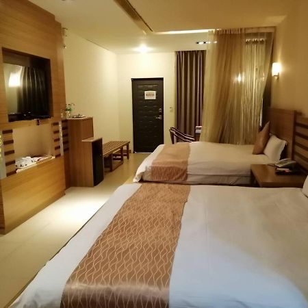 Nikaido Business Hotel Minxiong Екстериор снимка